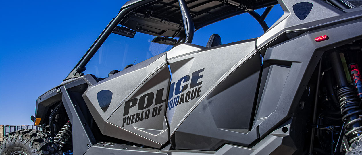Pojoaque PD wanted a simple, stealth look for their ATV (this photo is lit to show the graphics, the actual paint color is much closer to the black stealth graphics). In the woods, no one will see them coming!