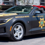 Bernalillo Sheriff wanted a matching set of recruiting vehicles, so they took a convertible Camaro and an Explorer and wrapped them with a satin OD Green gradient with yellow highlights. They certainly get noticed when they show up on the scene!